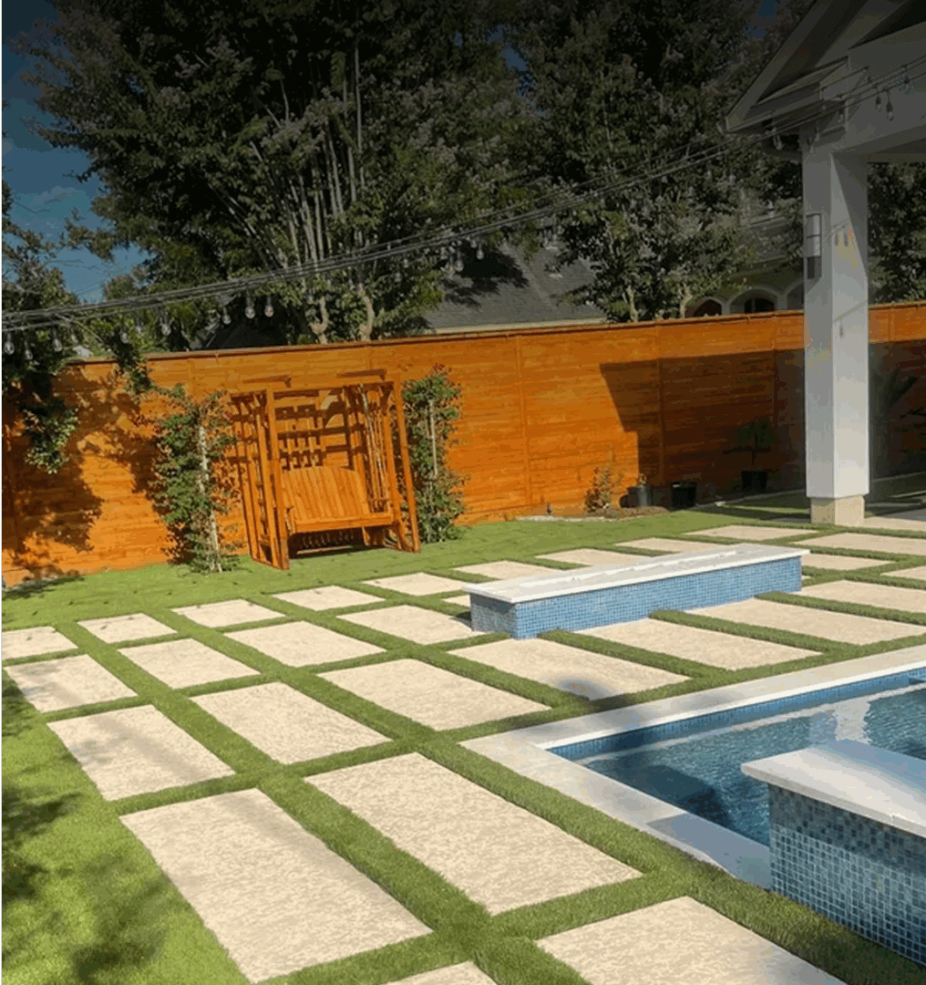 Modern backyard with pool and wooden trellis.